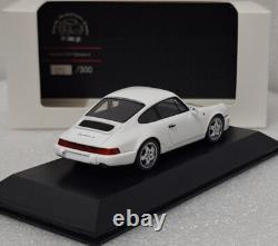 (9) Porsche 911 964 Carrera 4 White PMG Jahresmodell 2010 143 Spark MAP02007011