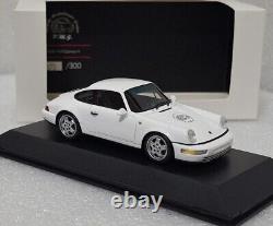 (9) Porsche 911 964 Carrera 4 White PMG Jahresmodell 2010 143 Spark MAP02007011