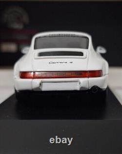(9) Porsche 911 964 Carrera 4 White PMG Jahresmodell 2010 143 Spark MAP02007011