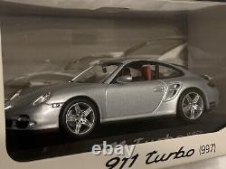 Porsche 911 Turbo (997) Silver/Red Minichamps 143