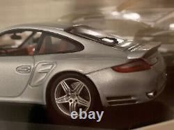 Porsche 911 Turbo (997) Silver/Red Minichamps 143