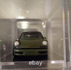 Porsche Green Diecast Model Car in Display Case