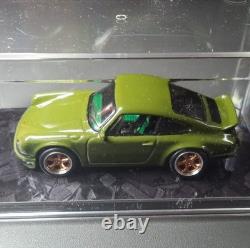 Porsche Green Diecast Model Car in Display Case