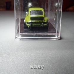 Porsche Green Diecast Model Car in Display Case