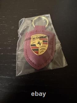 Porsche Special Edition Burgundy Leather Keychain with Emblem Used